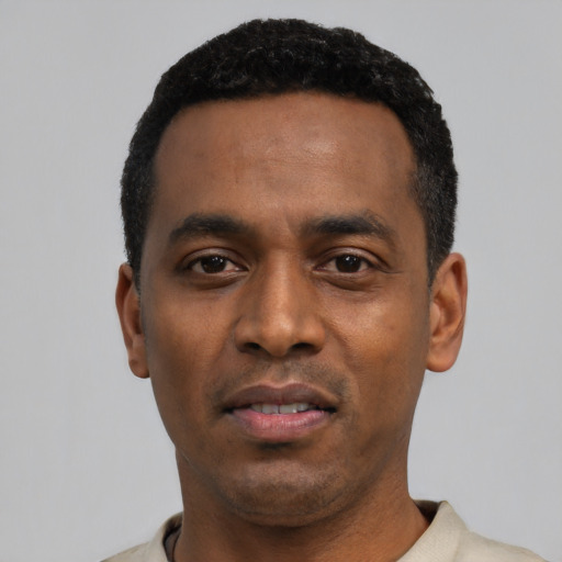 Neutral black young-adult male with short  black hair and brown eyes