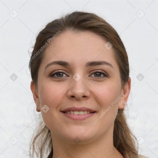 Joyful white young-adult female with long  brown hair and grey eyes