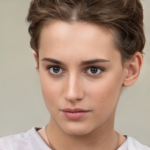 Neutral white young-adult female with short  brown hair and brown eyes