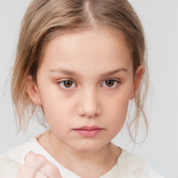 Neutral white child female with medium  brown hair and brown eyes