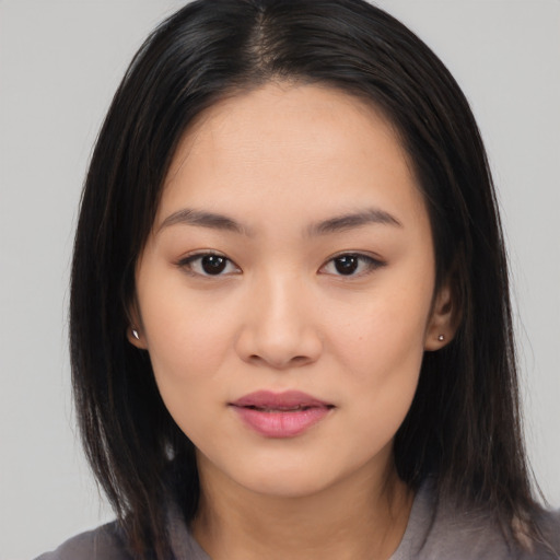 Neutral white young-adult female with medium  black hair and brown eyes