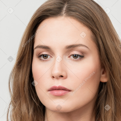 Neutral white young-adult female with long  brown hair and brown eyes