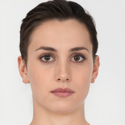 Neutral white young-adult female with short  brown hair and brown eyes