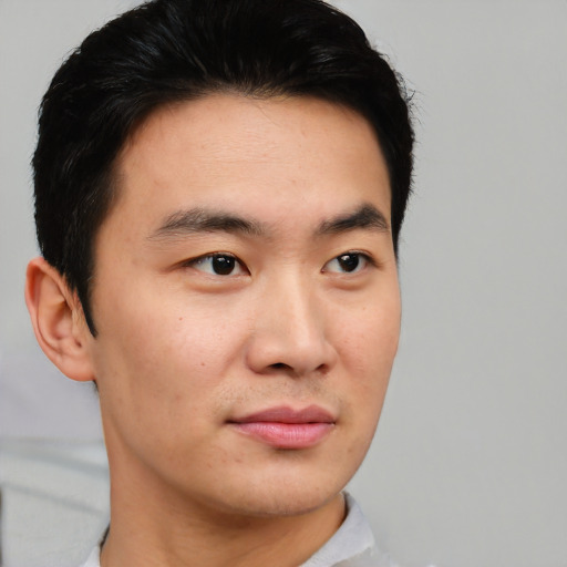 Neutral asian young-adult male with short  black hair and brown eyes