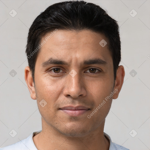 Joyful white young-adult male with short  black hair and brown eyes