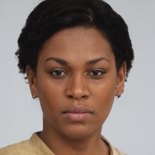 Neutral black young-adult female with short  brown hair and brown eyes