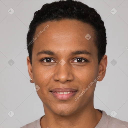 Joyful black young-adult male with short  black hair and brown eyes