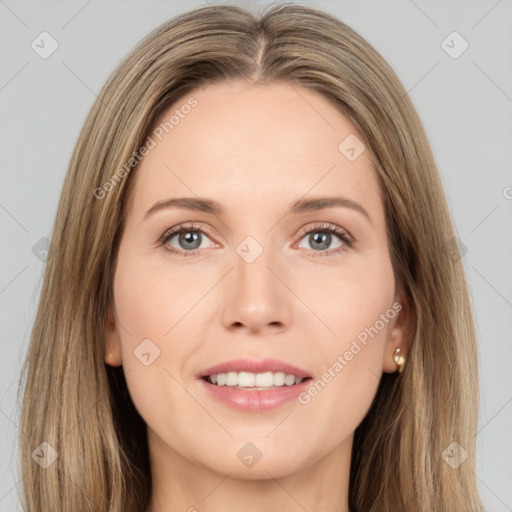 Joyful white young-adult female with long  brown hair and brown eyes