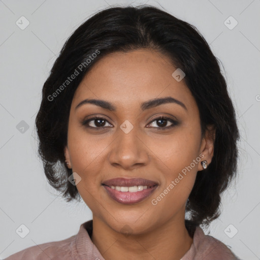 Joyful latino young-adult female with medium  brown hair and brown eyes