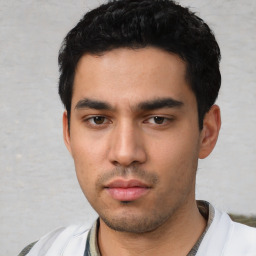 Neutral white young-adult male with short  black hair and brown eyes