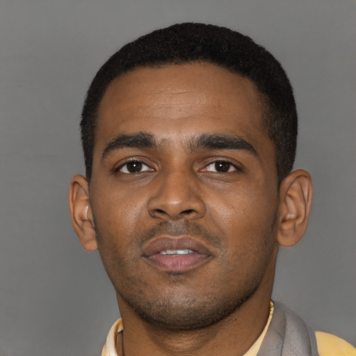 Neutral latino young-adult male with short  black hair and brown eyes