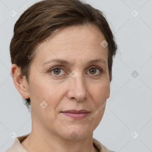 Joyful white adult female with short  brown hair and grey eyes