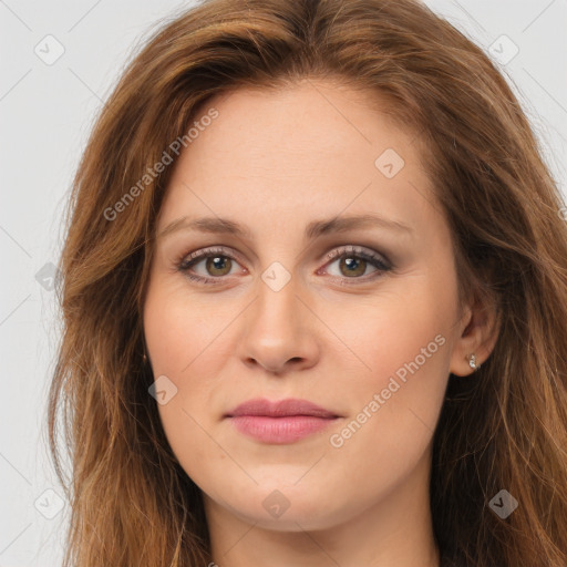 Joyful white young-adult female with long  brown hair and green eyes