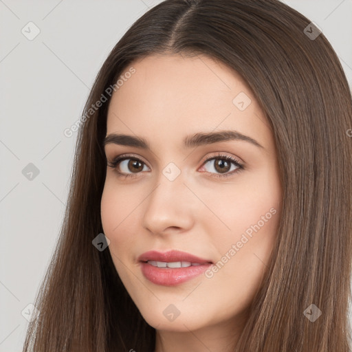 Neutral white young-adult female with long  brown hair and brown eyes