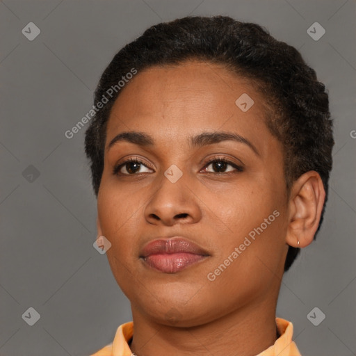 Joyful black young-adult female with short  brown hair and brown eyes