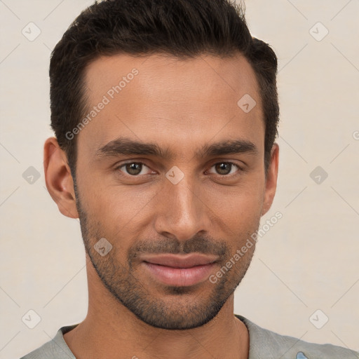 Joyful white young-adult male with short  brown hair and brown eyes