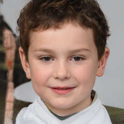 Joyful white child male with short  brown hair and brown eyes