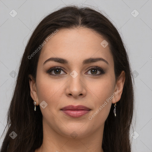 Joyful white young-adult female with long  brown hair and brown eyes