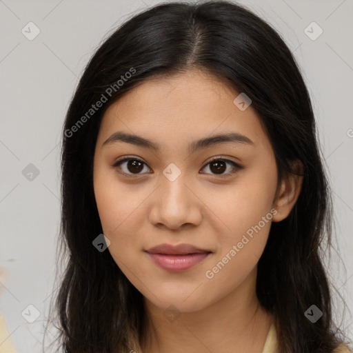 Joyful asian young-adult female with long  brown hair and brown eyes