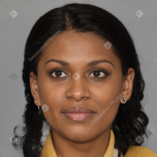 Joyful black young-adult female with medium  brown hair and brown eyes