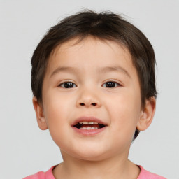 Joyful white child male with short  brown hair and brown eyes