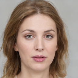 Neutral white young-adult female with medium  brown hair and green eyes