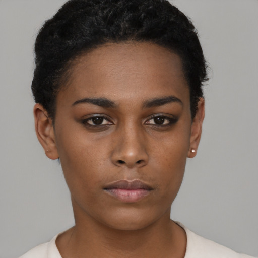 Neutral black young-adult female with short  black hair and brown eyes