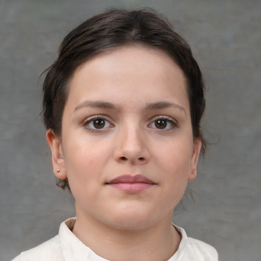 Neutral white young-adult female with short  brown hair and brown eyes