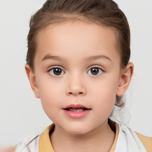 Neutral white child female with short  brown hair and brown eyes