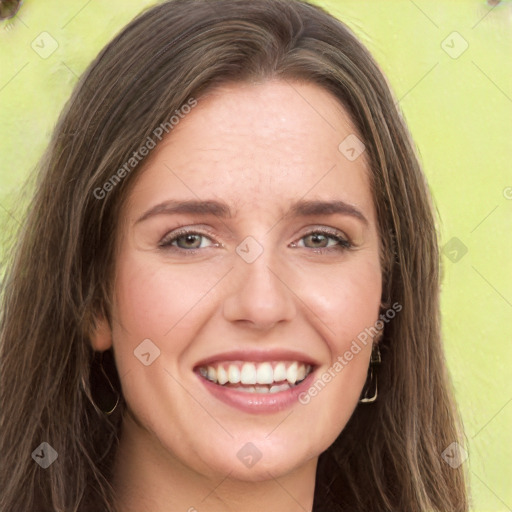 Joyful white young-adult female with long  brown hair and green eyes