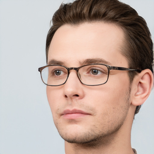 Neutral white young-adult male with short  brown hair and grey eyes