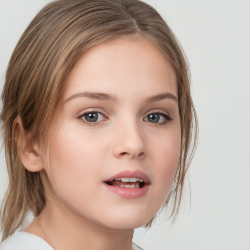 Joyful white child female with medium  brown hair and brown eyes