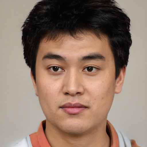 Neutral asian young-adult male with short  black hair and brown eyes