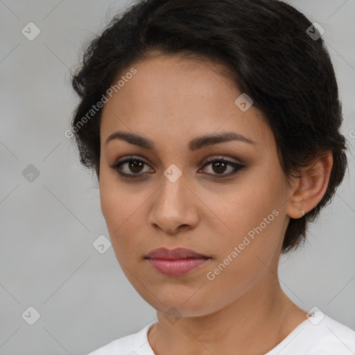 Joyful latino young-adult female with short  brown hair and brown eyes