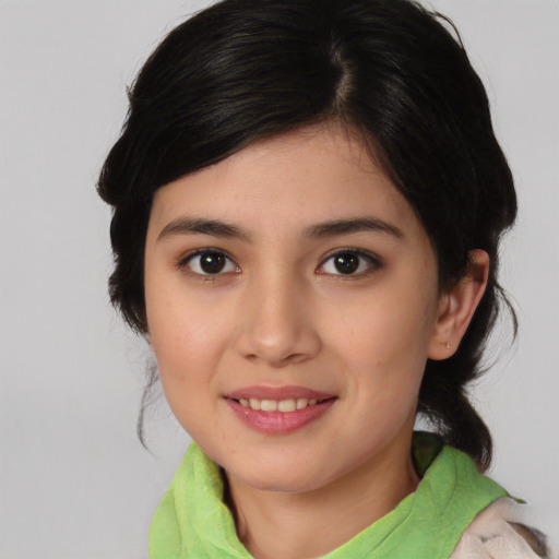 Joyful white young-adult female with medium  black hair and brown eyes