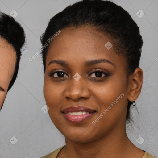 Joyful black young-adult female with medium  black hair and brown eyes