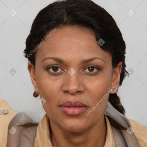 Joyful black adult female with short  brown hair and brown eyes