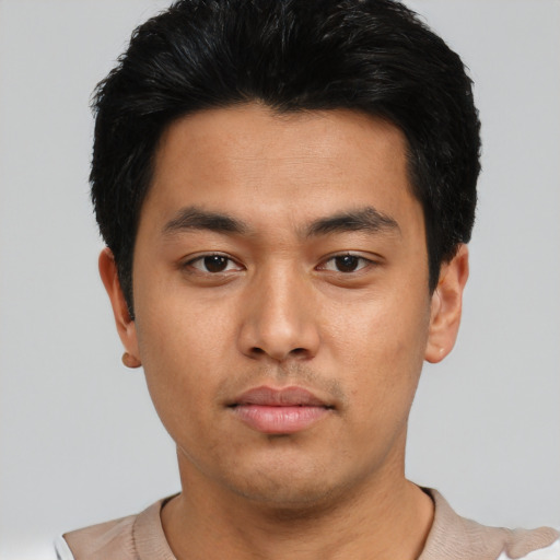 Neutral asian young-adult male with short  black hair and brown eyes