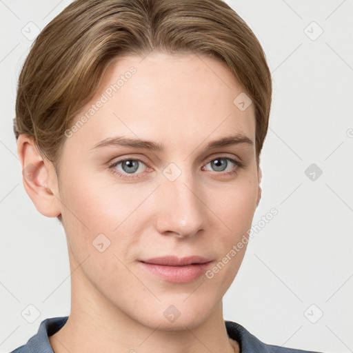 Joyful white young-adult female with short  brown hair and grey eyes