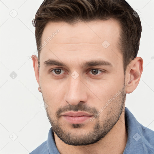 Neutral white young-adult male with short  brown hair and brown eyes