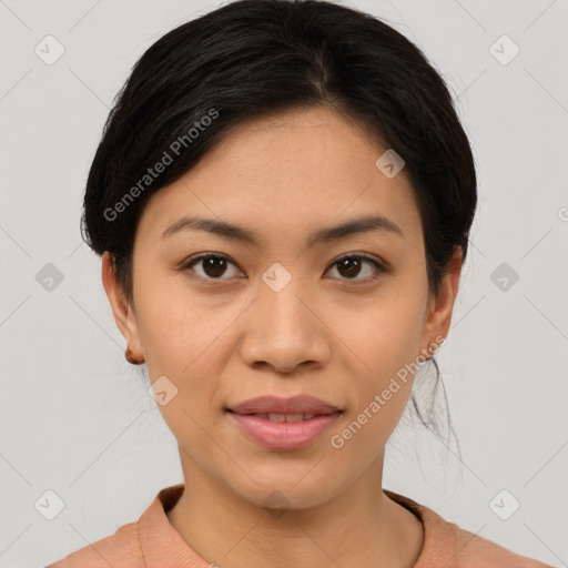 Joyful asian young-adult female with short  brown hair and brown eyes