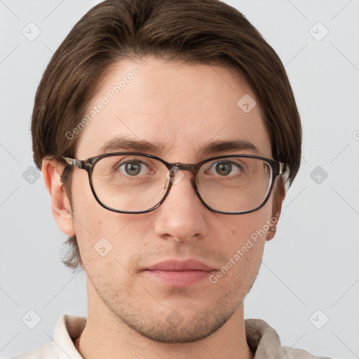 Neutral white young-adult male with short  brown hair and grey eyes