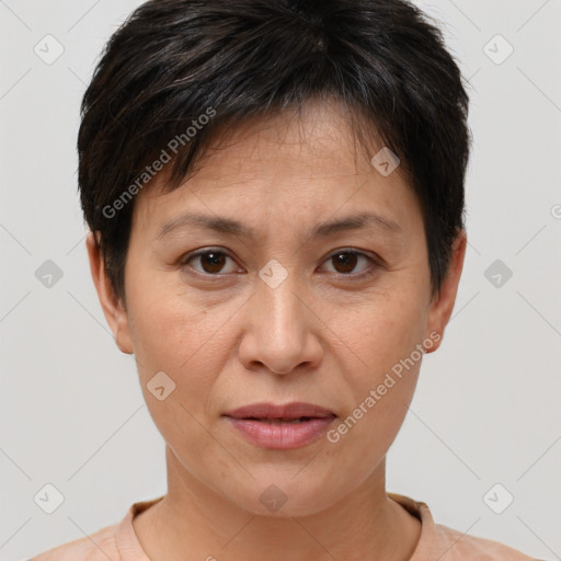 Joyful white adult female with short  brown hair and brown eyes