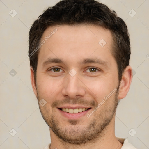 Joyful white young-adult male with short  brown hair and brown eyes