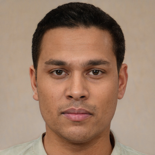 Neutral latino young-adult male with short  brown hair and brown eyes
