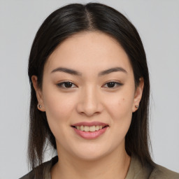 Joyful asian young-adult female with medium  brown hair and brown eyes