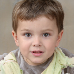 Joyful white child male with short  brown hair and brown eyes