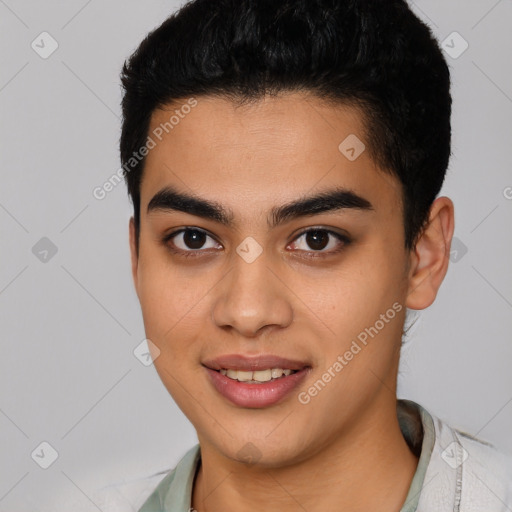 Joyful latino young-adult male with short  black hair and brown eyes