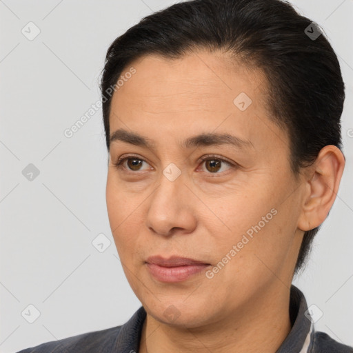 Joyful white adult female with short  brown hair and brown eyes