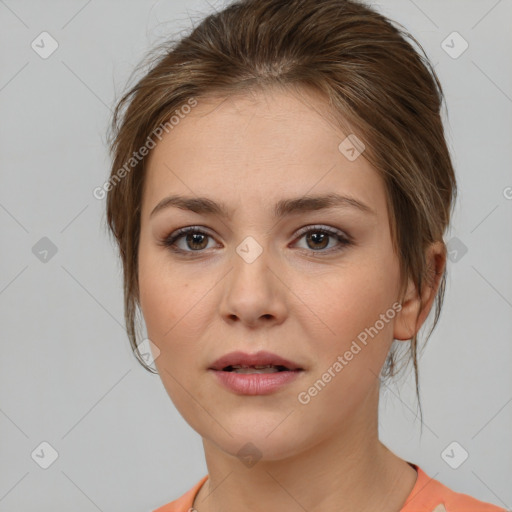 Neutral white young-adult female with medium  brown hair and brown eyes